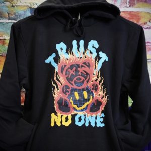 A black hoodie featuring the phrase "trust no one" prominently displayed on the front.