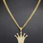 A gold crown pendant adorned with sparkling diamonds, showcasing elegance and luxury in its intricate design.
