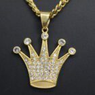 A gold crown pendant adorned with sparkling diamonds, showcasing elegance and luxury in its intricate design.