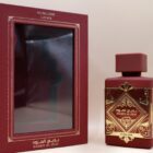 A luxurious bottle of the best perfume elegantly displayed in a striking red box, exuding sophistication and allure.
