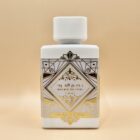 A white bottle of the best perfume elegantly displayed in a stylish box, showcasing its luxurious design and appeal.