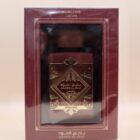 A luxurious bottle of the best perfume elegantly displayed in a striking red box, exuding sophistication and allure.