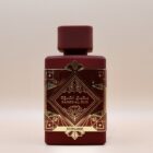 A luxurious bottle of the best perfume elegantly displayed in a striking red box, exuding sophistication and allure.